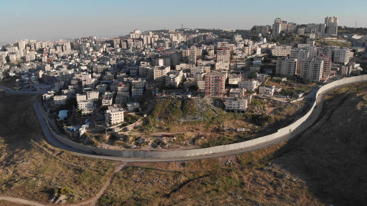 Israel wall fence in Jerusalem aerial view