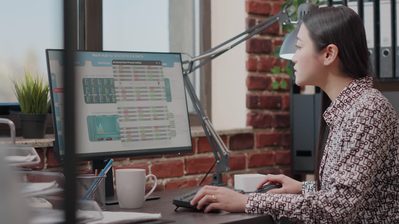 Close up of woman working with stock market exchange