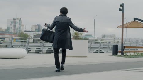 excited man on the urban street
