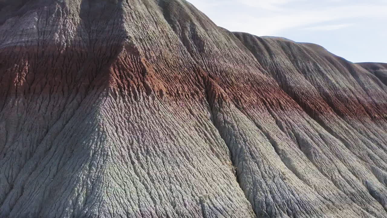 Aerial perspective of the mudstones beautiful color display in Badlands, Arizona, USA
