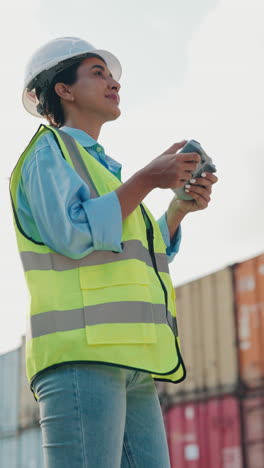 female drone operator at a cargo port