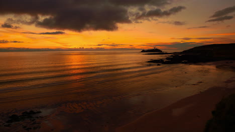 Cinemagraph-seamless-video-loop-of-a-calm-sunset-evening-seaside-beach-close-to-St-Ives-in-Cornwall,-England,-UK