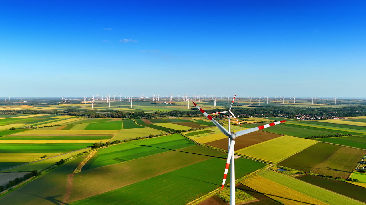 Renewable energy in Europe. Aerial view highlights wind turbines in Europe's fields, showcasing the region's commitment to renewable energy