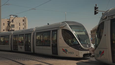 light rail train through old city of jerusalem israel with modern transportation for tourists