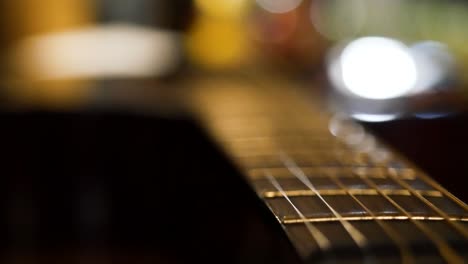 close-up of an acoustic guitar neck