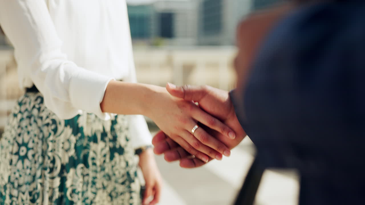 Partner, deal and business people in a city