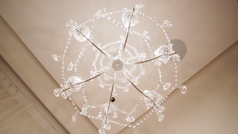 Chandelier-With-Crystals-Accent-Hanging-On-Ceiling