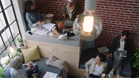 diverse business women brainstorming team discussing creative marketing strategy sharing ideas working on startup project together enjoying teamwork in relaxed modern office workplace top view