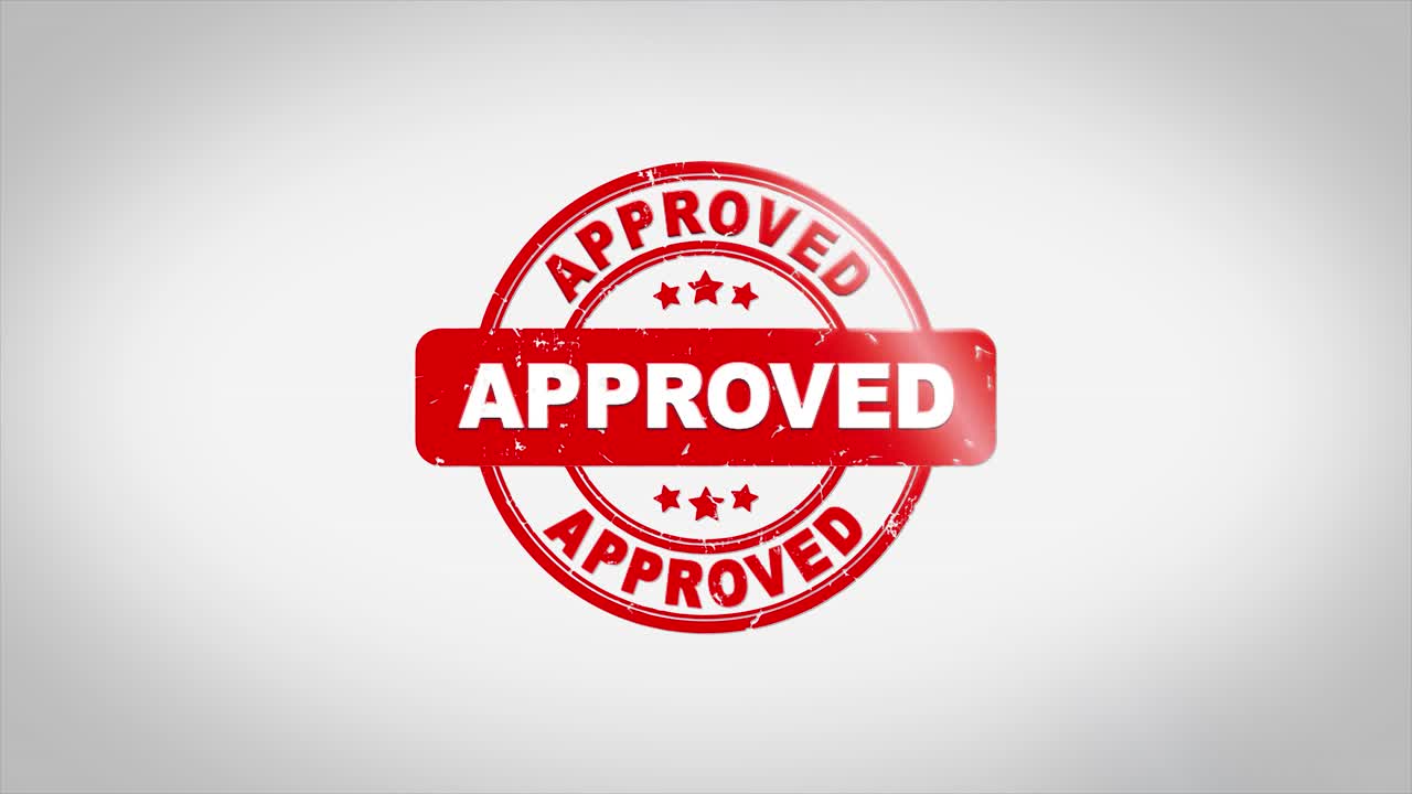 Approved signed stamping text wooden stamp animation red ink on clean white paper surface background