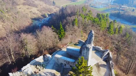 Aerial drone shot flying over Zovnek castle in Braslovce, Slovenia