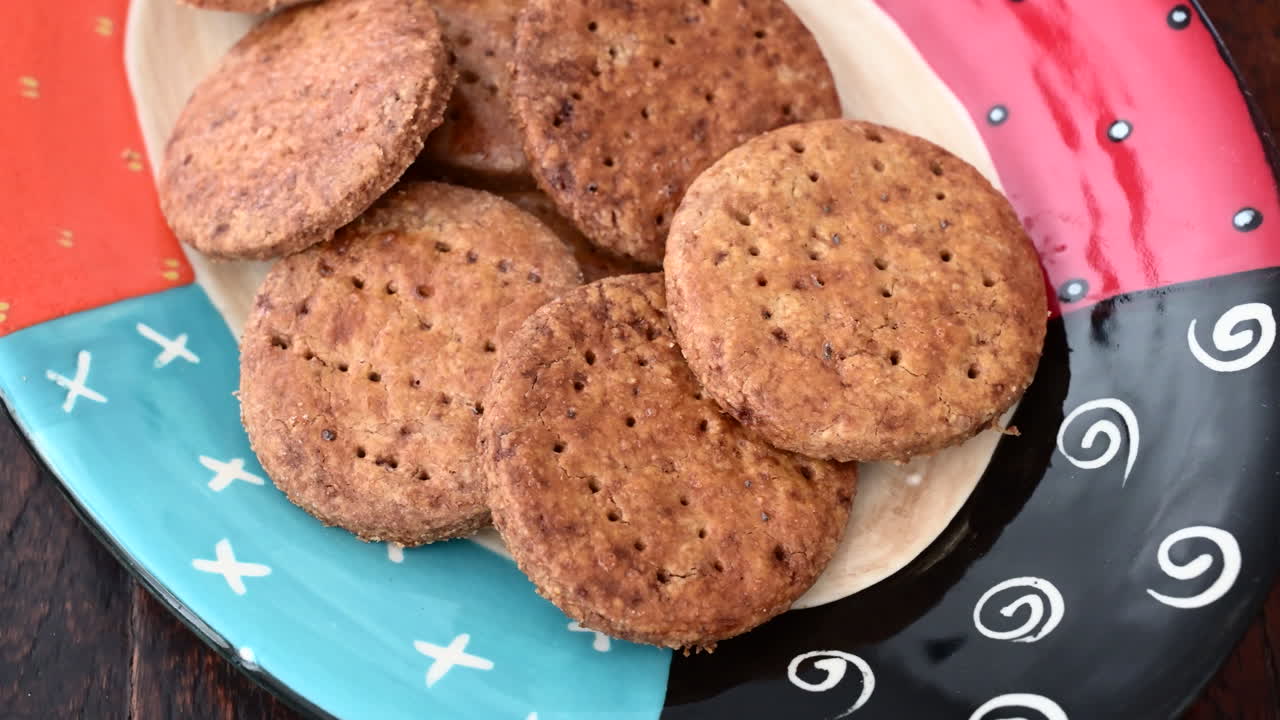 Colorful plate with homemade cookies, dolly shot right to left