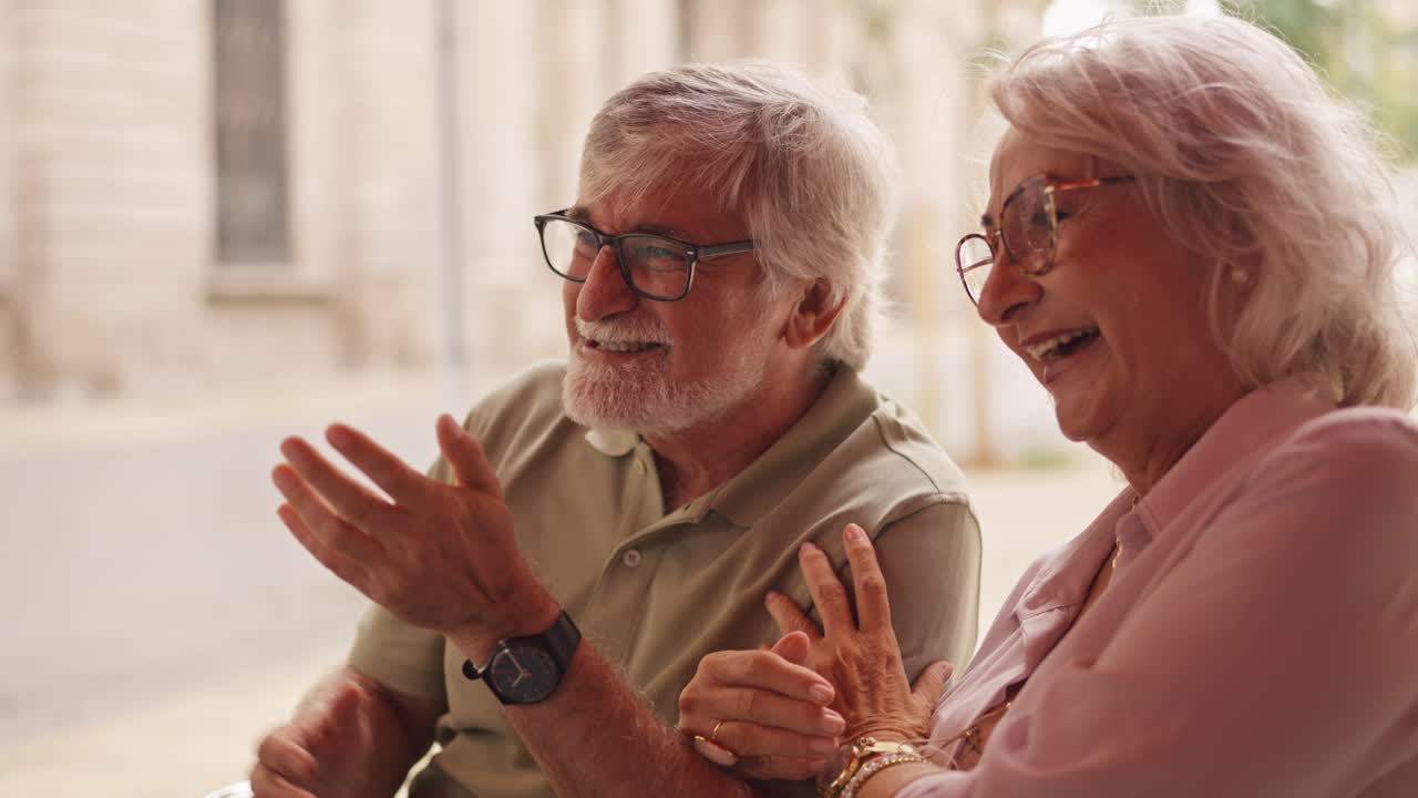Happy Elderly Couple Laughing Together