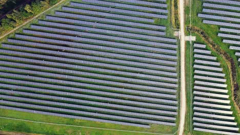 Aerial-View-Of-Solar-Panels-Field,-Solar-Powered-Electricity-In-Utby,-Gothenburg,-Sweden---drone-shot