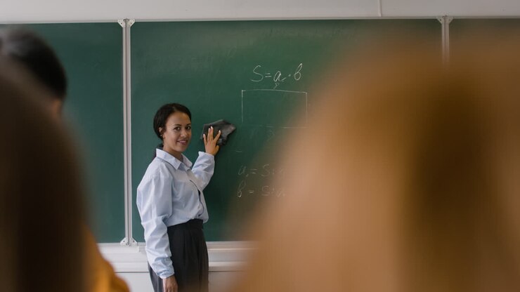 Teacher and students at the end of the class.