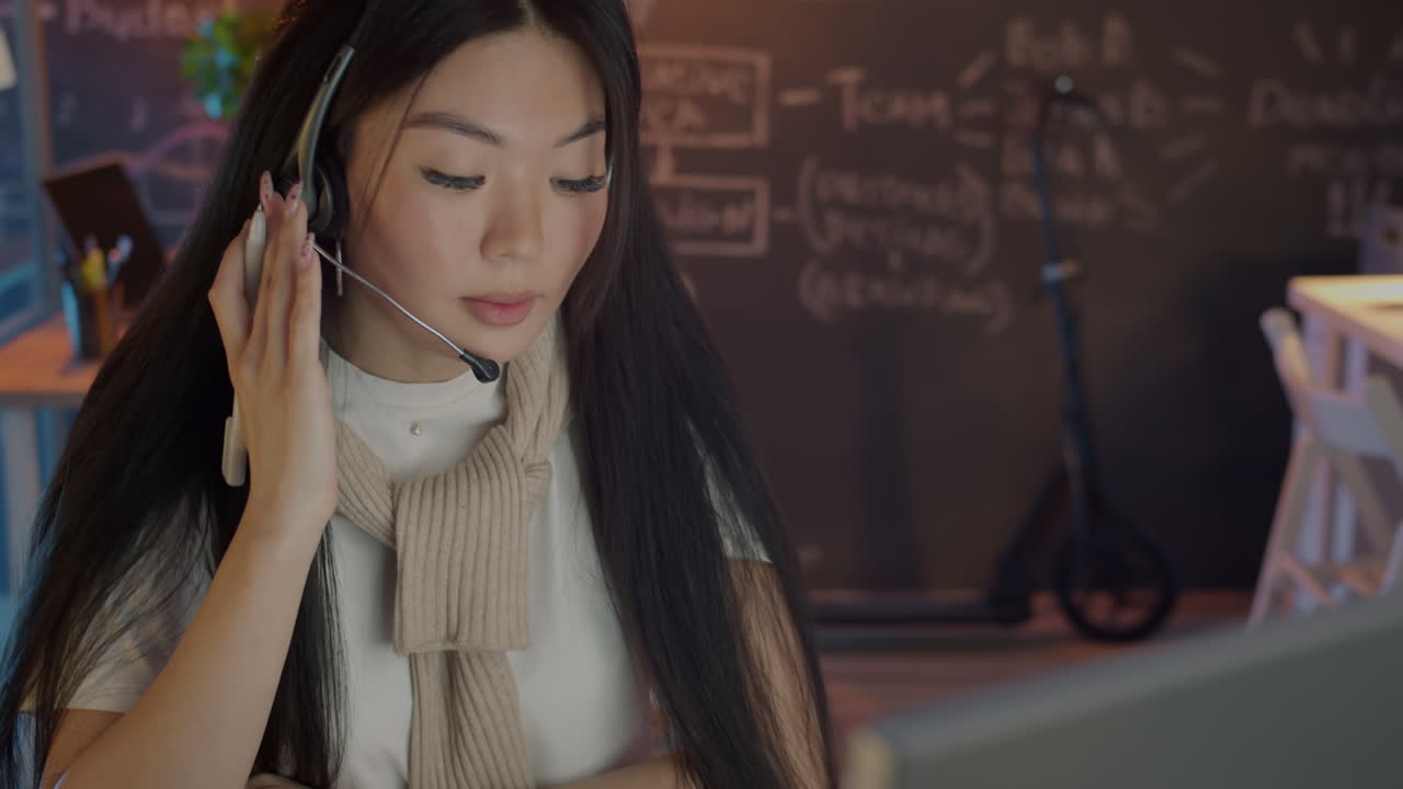 Asian woman working at call center