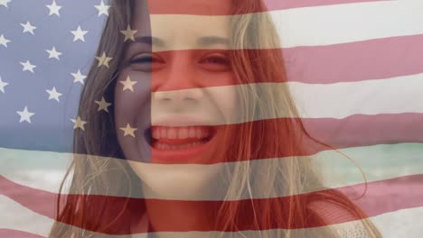 animation of flag of usa over caucasian woman smiling