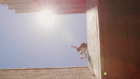 caucasian man practicing parkour