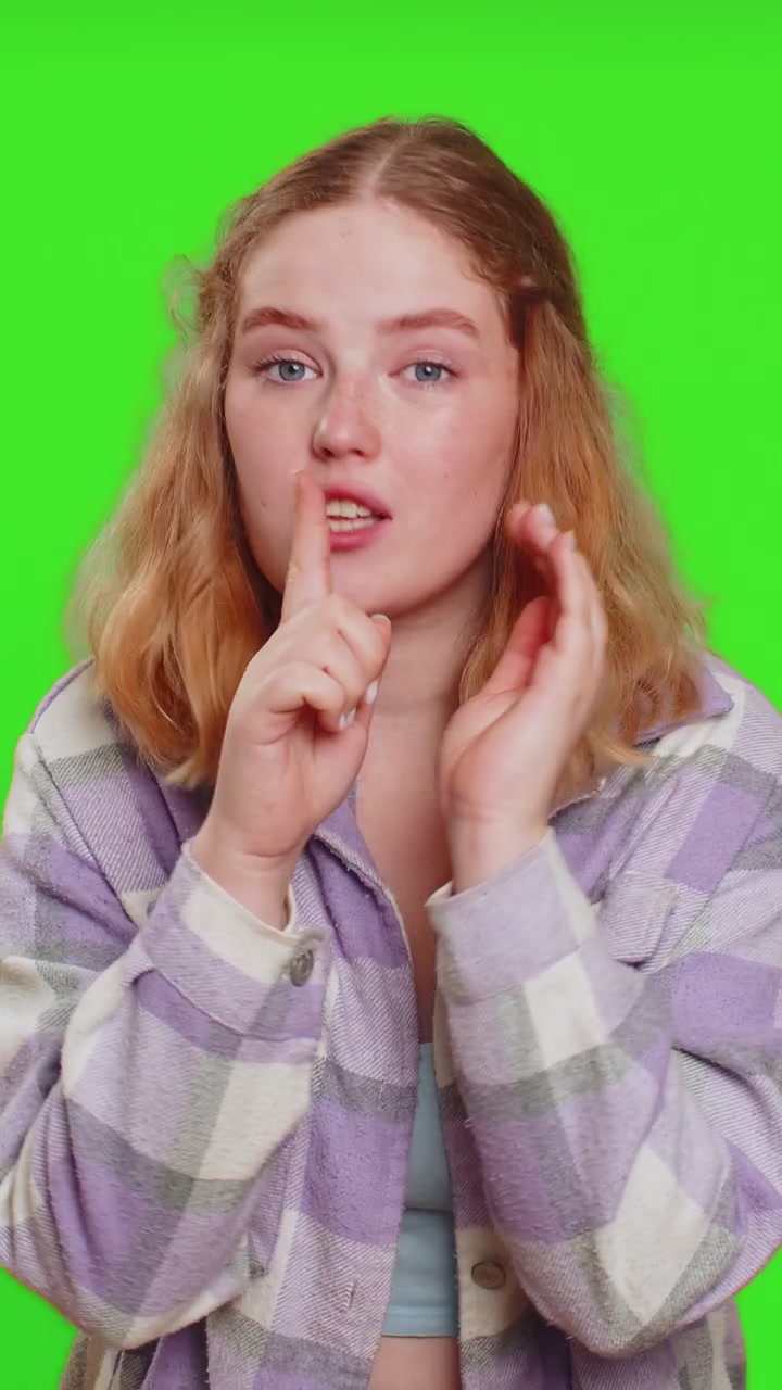 Young woman whisper news rumors holding hands near mouth share gossip quiet keep my secrets