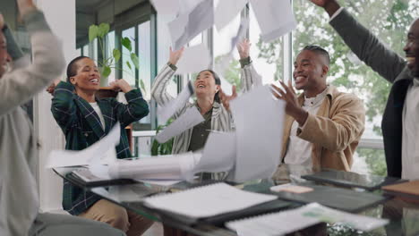 happy business people throw paper for success