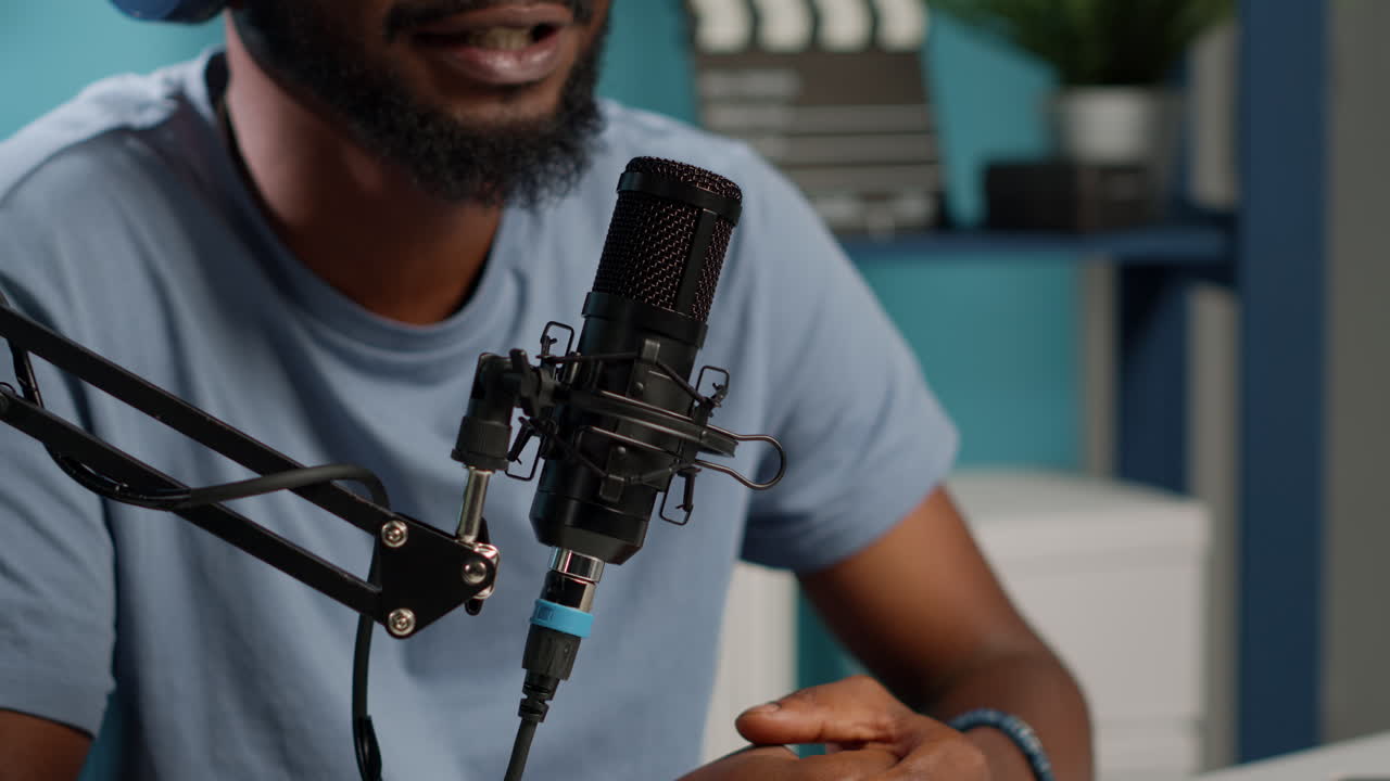 Close up of influencer using microphone to talk on online podcast