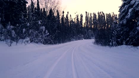 Fresh-snowmobile-tracks-in-the-snow