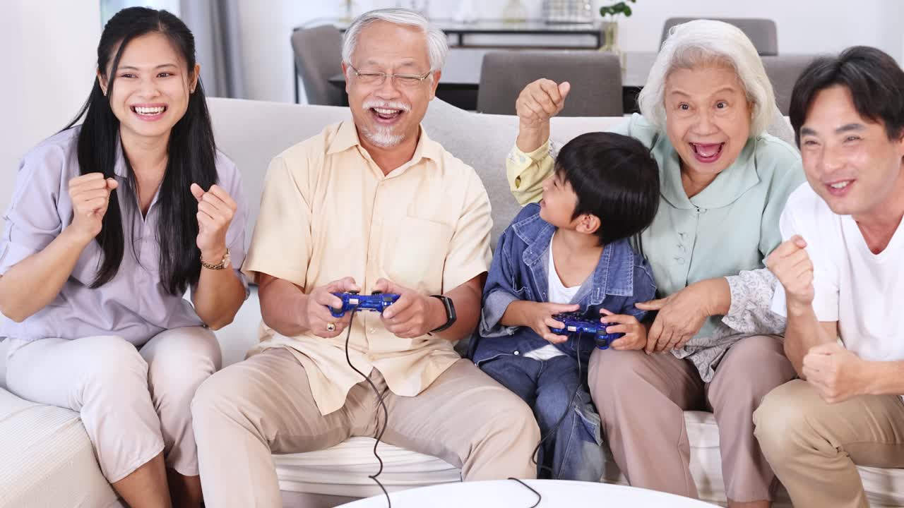 A joyful family of five plays video games in a bright living room, capturing moments of excitement and togetherness