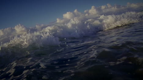 pov shot of waves crashing into shore including underwater perspective 2