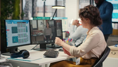 vertical video businesswoman participates at web chat event with a shareholder