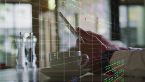 animation of stock market data processing over mid section of a man using digital tablet at a cafe