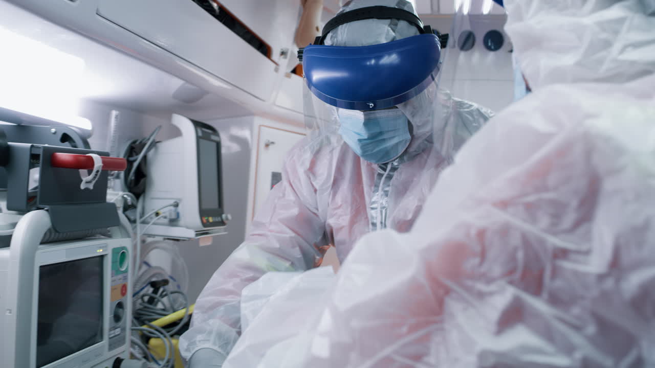 Medical Personnel Attending to a Patient in an Ambulance