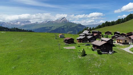 idyllic alpine village in a green mountain valley