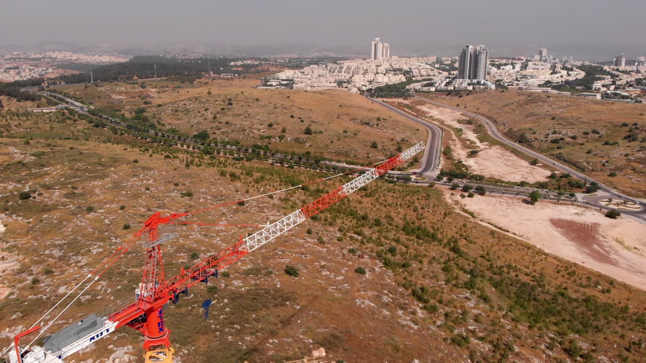 Cranes and Construction Site in Modiin City Aerial view