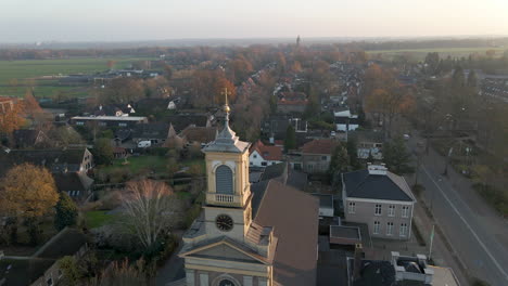 aerial of golden crucifix on top of church tower