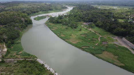 Aerial-view-of-river-in-tropical-green-forest-in-Indonesia