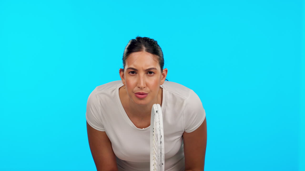 Face, tennis and serious woman with racket
