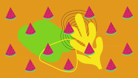 animación de sandía girando sobre formas en un fondo naranja