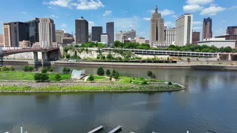 saint paul skyline as seen from drone above mississippi river and raspberry island on beautiful summer day