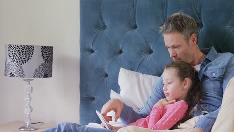 father and daughter using mobile phone 4k