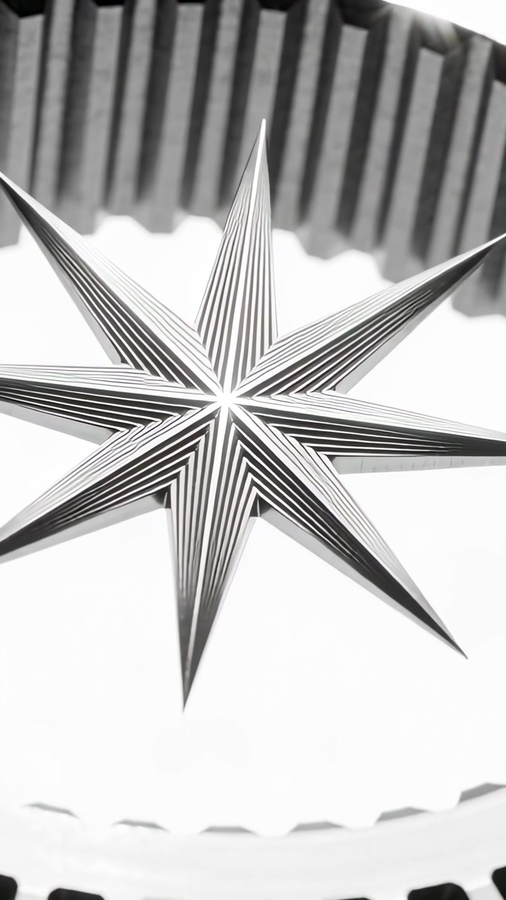 Vertical video: Starting recording, eight-pointed star rotating in studio, showing corrugated ring