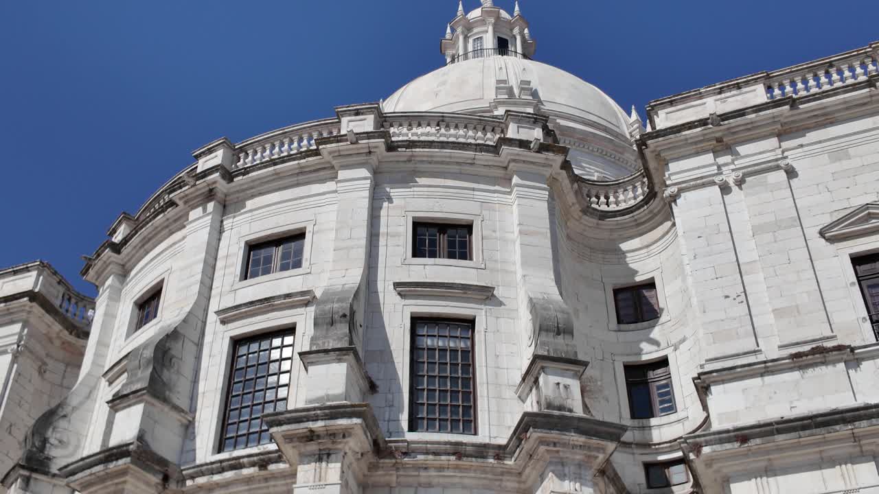 Elegant exterior of Lisbon's National Pantheon showcasing ornate sculptures and historical details