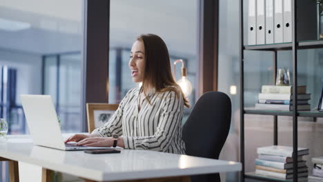 a-young-woman-using-a-laptop-to-make-a-video-call