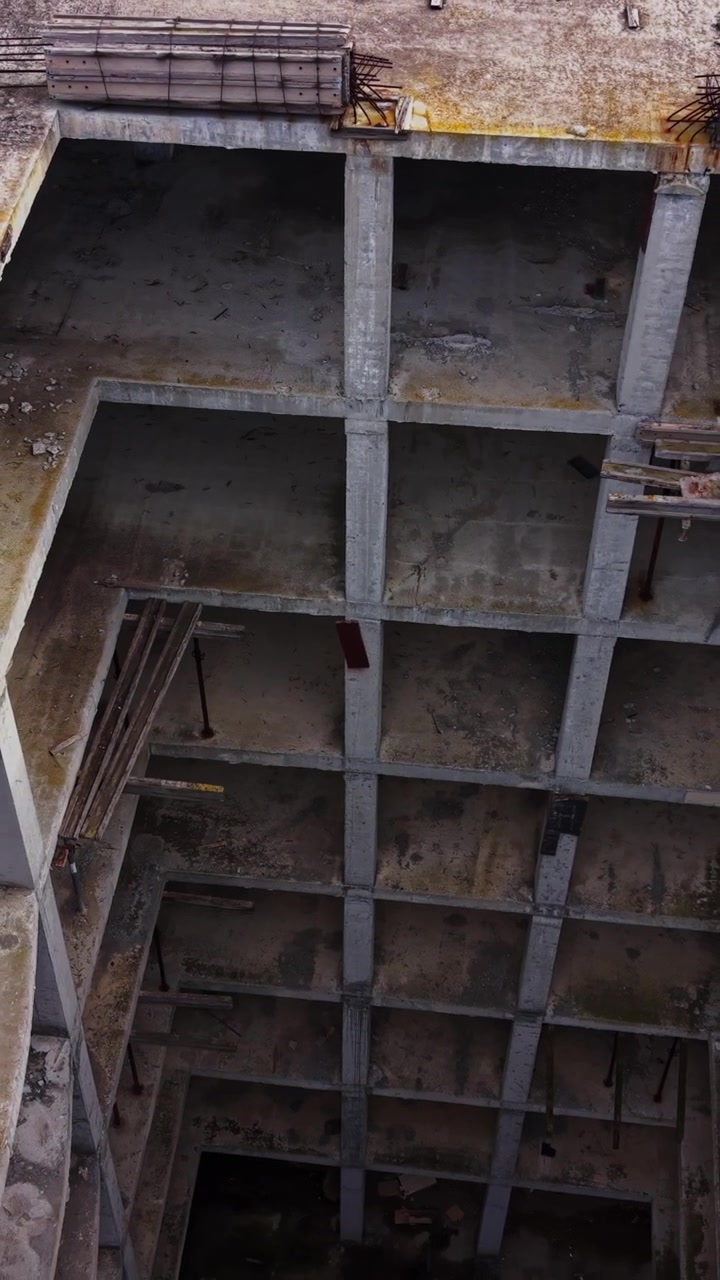 Aerial view of an abandoned building with open floors