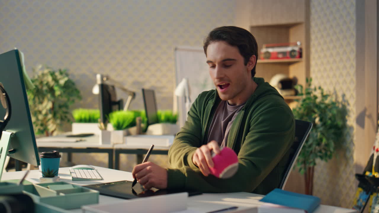 Creative artist staring computer screen modern office. Smiling man having idea