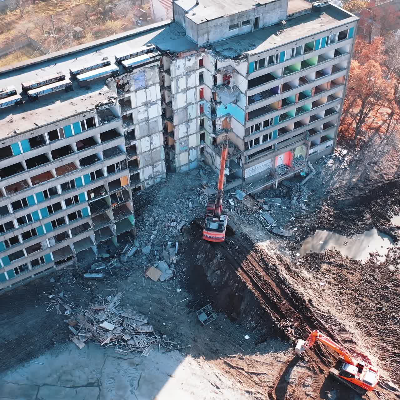 Special machinery destroys old buildings. Destruction of a building with special machine