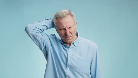 older man looking confused