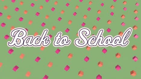 animación del texto de regreso a la escuela sobre cubos sobre fondo verde