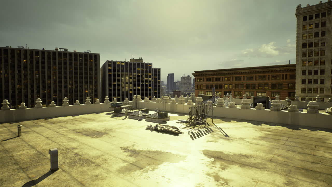 View from a rooftop overlooking a city skyline during the day with clear skies