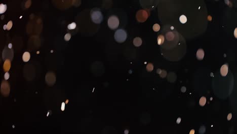 bokeh de partículas abstractas flotantes sobre fondo oscuro
