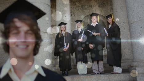 grupo de estudiantes internacionales felices en vestidos de soltero con diplomas