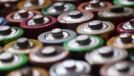 close up of positive ends of aa batteries selective focus close up of positive ends of aa batteries hazardous garbage concept